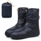 Lixada Down Booties worn at a camping site for warm, lightweight comfort.