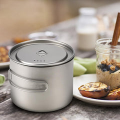 Lixada titanium camping pot 900ml demonstrates corrosion resistance and compact portability.