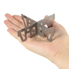 Lixada titanium stove rack packed for travel demonstrating compact form and easy transport.