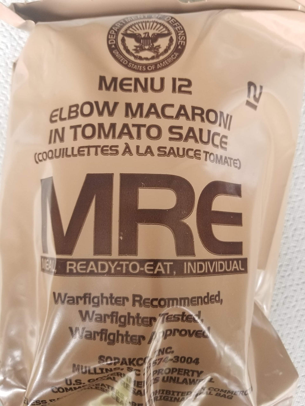 LoJo Surplus MRE elbow macaroni in tomato sauce, 1250 calories per meal, ideal for hiking and emergencies.