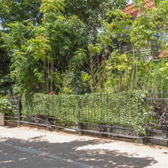 LOOGU camo netting camping scene showing lightweight, concealing shelter.