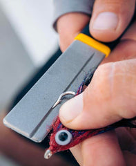 Loon Apex Hook Hone XL line tensioning hole aids knot control.