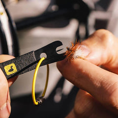 Rogue Nippers with built-in fly eye cleaner in use
