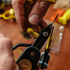 Loon Outdoors Vise Pawn on a vise, compatible with most vises, for quick material access