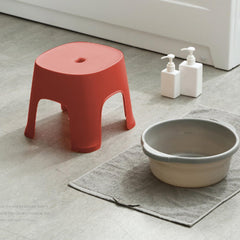 Lovskoo plastic mini stool in bathroom for shower access and quick reach.