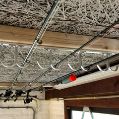 Ceiling-mounted fishing rod holder displaying 8 rods