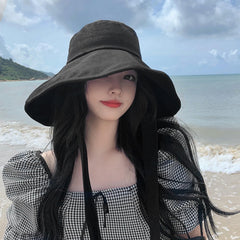 Side view showing adjustable chin strap on LumiSyne hat