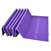 Luqeeg foam sleeping pad in compact fold for easy backpacking and quick rests.
