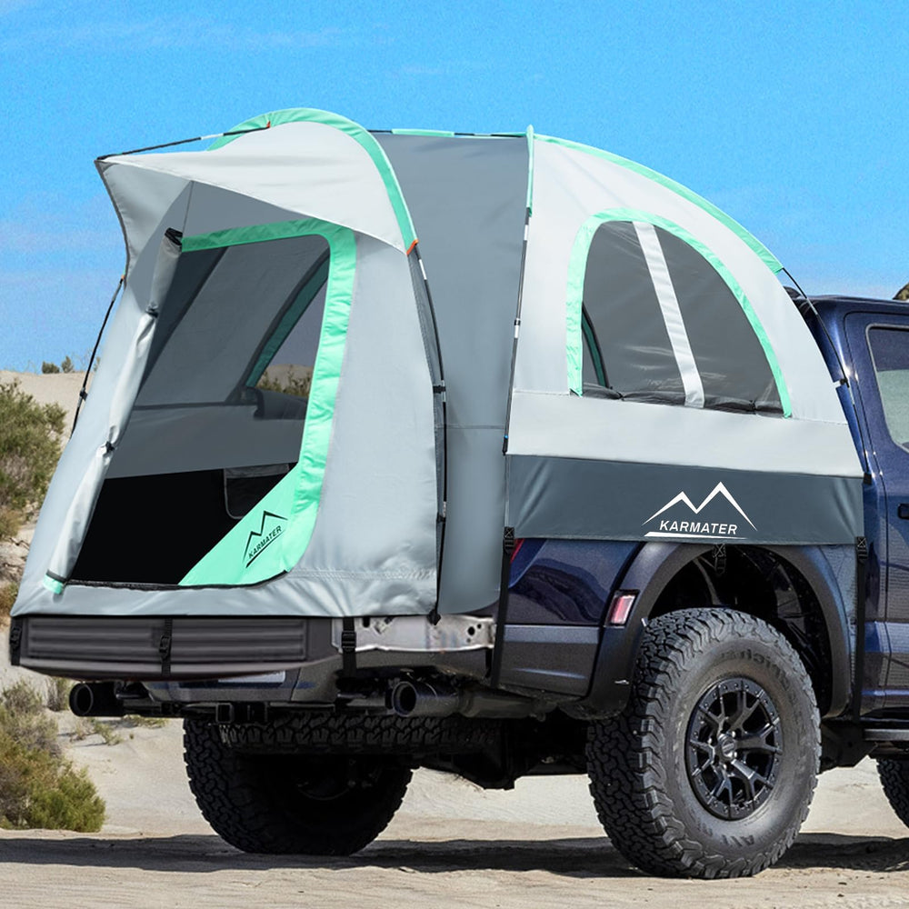 M KARMATER pickup tent waterproof coating shields campers from rain at a roadside site.