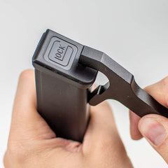 Disassembling Glock magazine plate for maintenance using Otis tool