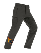 MAGCOMSEN waterproof ripstop shell on ski pants for rugged outdoor protection.