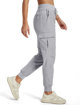 MAGCOMSEN women's cargo joggers pocket close-up with secure zippers for essentials