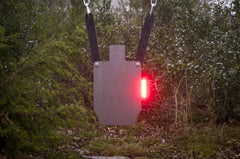 MagnetoSpeed T1000 Gen 2 hit indicator mounted on AR500 target for instant feedback.