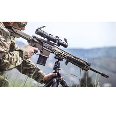 Magpul M-LOK Tripod Adapter mounts to RC2/Q2 heads for secure rifle-to-tripod integration.