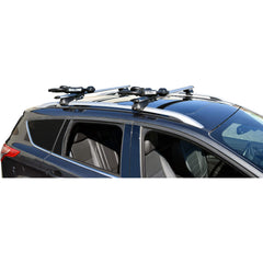 Malone FoldAway J Kayak Carrier deployed on a roof rack ready to secure a kayak.