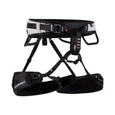 Mammut Ophir 3 Slide harness shown on a rock wall for versatile climbing.
