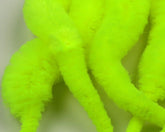Mangums Micro Dragon Tails fluorescent yellow close-up highlighting vibrant color for trout lure appeal