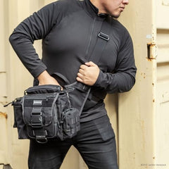 Maxpedition Jumbo Versipack side pocket holds a 32 oz Nalgene bottle for hydration.