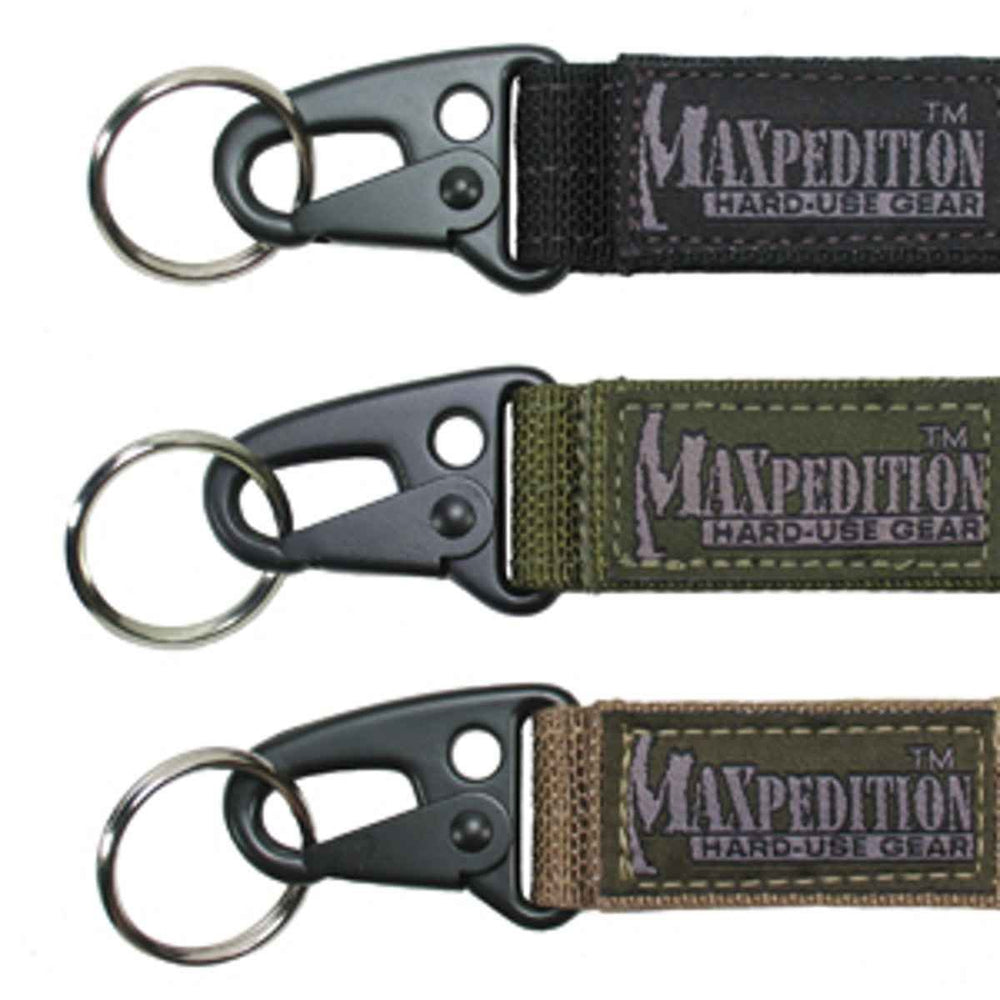 Maxpedition Keyper closeup in black showing compact retention and quick belt access