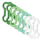 MECCANIXITY bone-shape clip cream white secures keys on a backpack