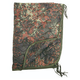 Mil-Tec Ripstop Poncho Liner in compact pack for portable warmth.