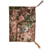 Mil-Tec Ripstop Poncho Liner in compact pack provides lightweight warmth on outdoor trips.