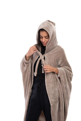 Mintra Home Wearable Blanket Hoodie in Mocha showcased on a couch for instant warmth.