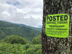 Minuteman Signs posted sign green offers visible warning for yards and properties.