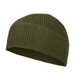 M McGuire Gear grid fleece cap on head providing lightweight warmth for outdoor adventures.