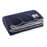 M MCGUIRE GEAR heavy-duty wool blanket in navy provides full-body warmth for outdoor adventures