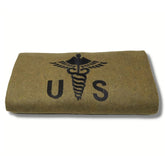 M MCGUIRE GEAR military wool blanket in olive drab for rugged warmth outdoors.