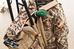 MOJO Outdoors Mojo Pack weather flap protects valuables from rain during hunts.