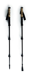 Montem rubber tips close-up highlights vulcanized protection for poles on gravel and pavement.