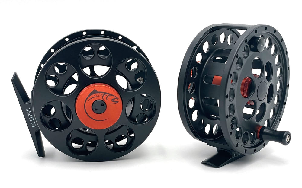 Moonlit Eclipse Fly Reel in burnt orange and matte black, with smooth drag for precise line control.