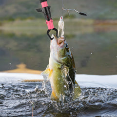 Close-up of Mouhike fishing pliers handle in pink and black