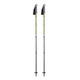 Mountainsmith Rhyolite trekking poles in emerald green provide stable grip on rugged trails.
