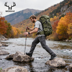 MOXULE Pro 3600 top hat-daypack shows detachable carry for quick side trips.