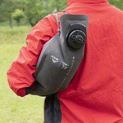 MSR Dromedary Bag in use, delivering water on a long trek with ease.