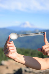 MSR Titan long spoon reaches deep into a freeze-dried meal pouch