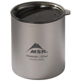 MSR Titan ultralight camp mug with lid in top view highlights compact backcountry coffee cup.
