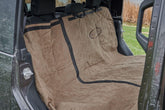 Mud River Split Hammock Seat Cover taupe front view; protects upholstery from fur.