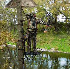 Muddy Pop-Up Umbrella with hub-style setup enables quick tree-stand shelter.