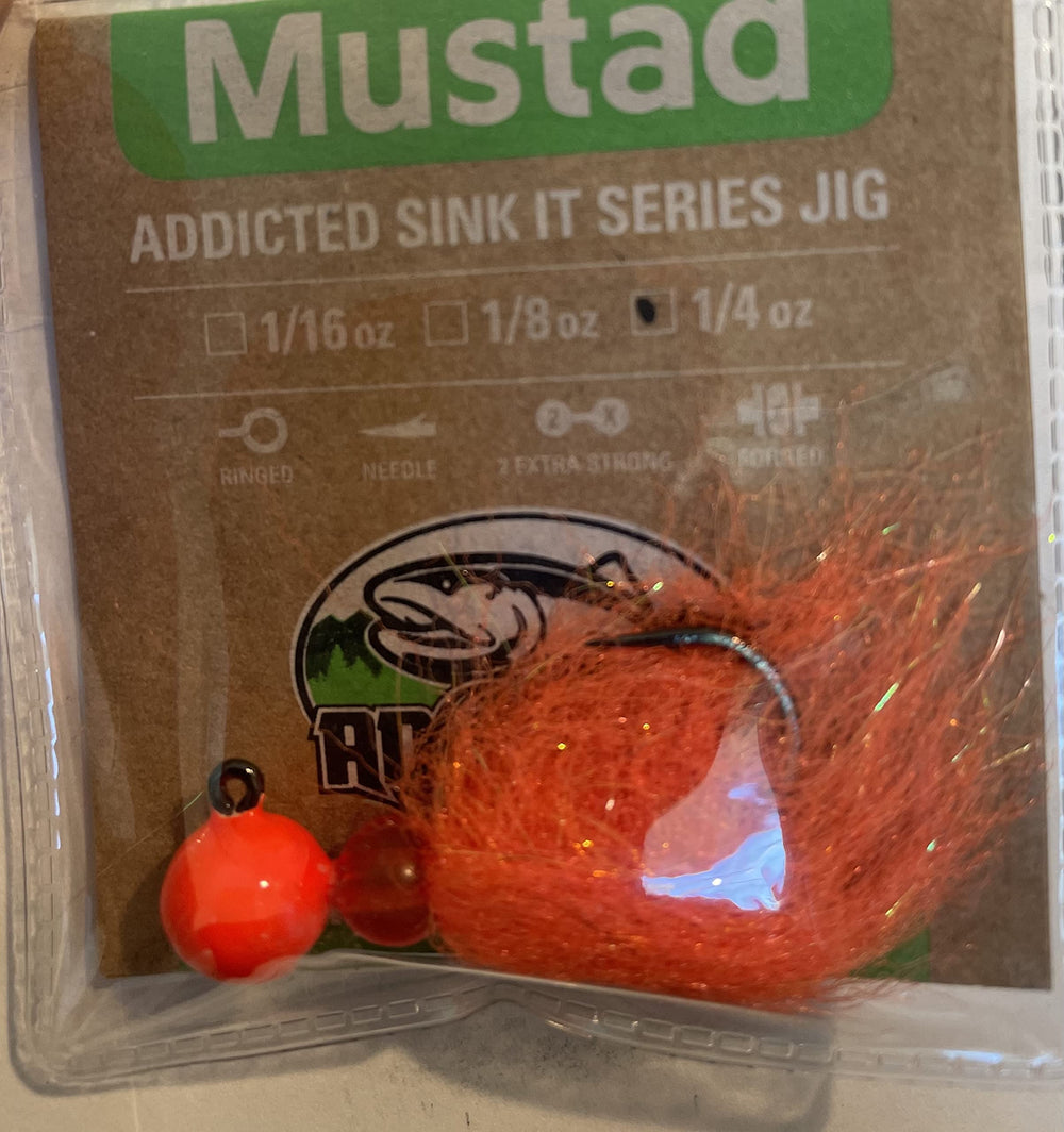 Mustad Sink It Series Jig in UV orange, ideal for enticing salmon, steelhead, and trout.