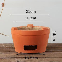 Mwpqbd Chaozhou red clay stove detail with charcoal grate and efficient heat flow.