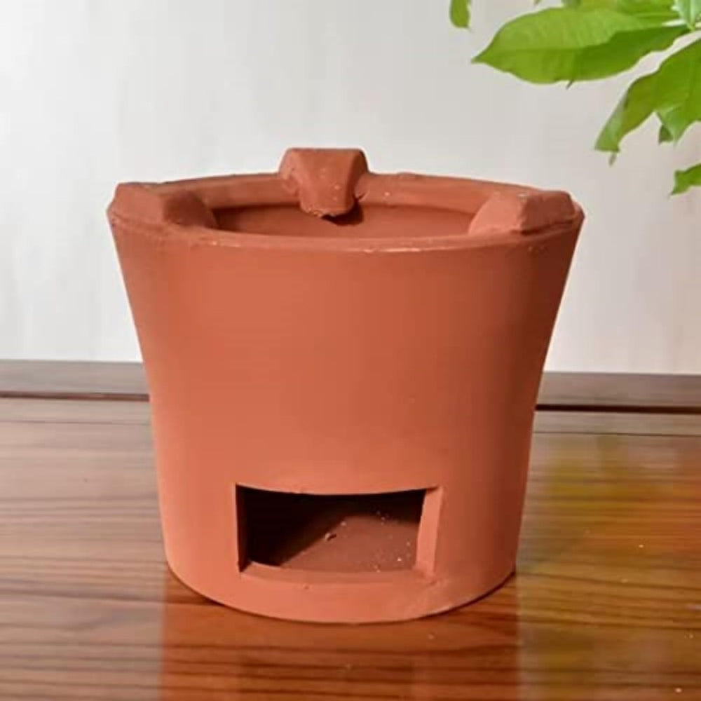 Mwpqbd rare red clay stove exterior showcases rustic charm for outdoor cooking.