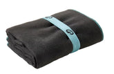 Nabaiji microfibre towel L Grey laid beside pool, quick-drying and soft.