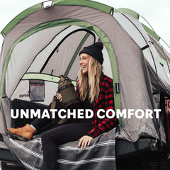 Napier Backroadz truck tent interior shows spacious two-person sleeping area in a truck bed.