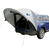Napier Sportz Cove hatch shade extending over the hatch for sun protection during camping.