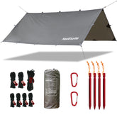 NatEtoile camping tarp in rain-fly setup demonstrates rugged waterproof protection.