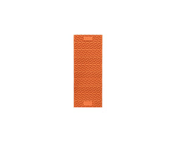 NEMO Switchback foam sleeping pad Short in Sunset Orange on a rugged campsite, highlighting plush comfort